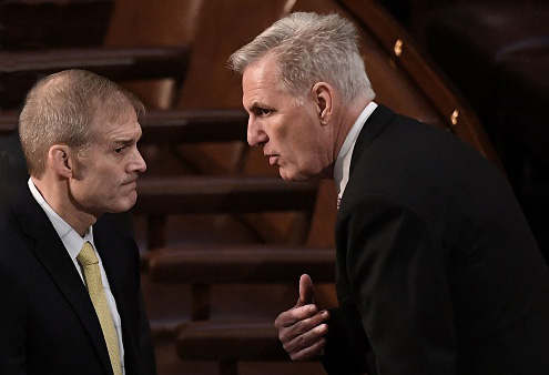 Republicans Jim Jordan and Kevin McCarthy on the floor of the U.S. House of Representatives.